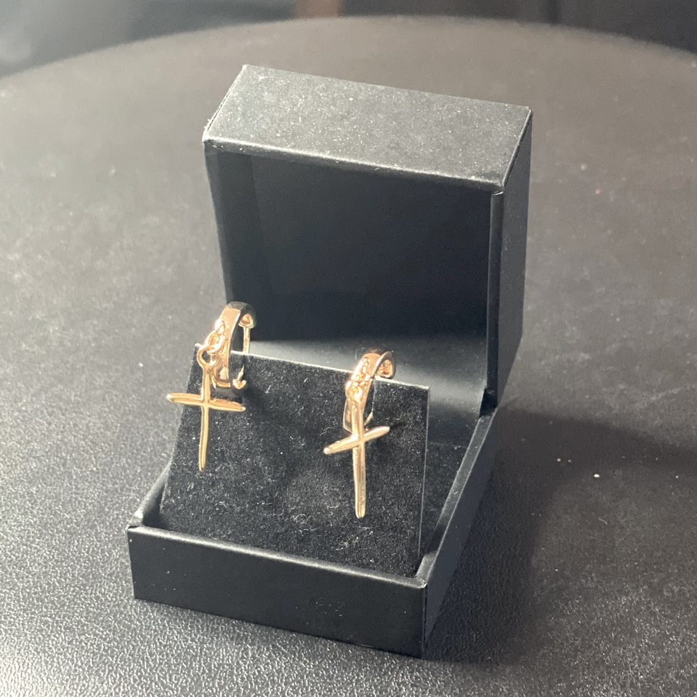 Gold cross huggie hoop earrings